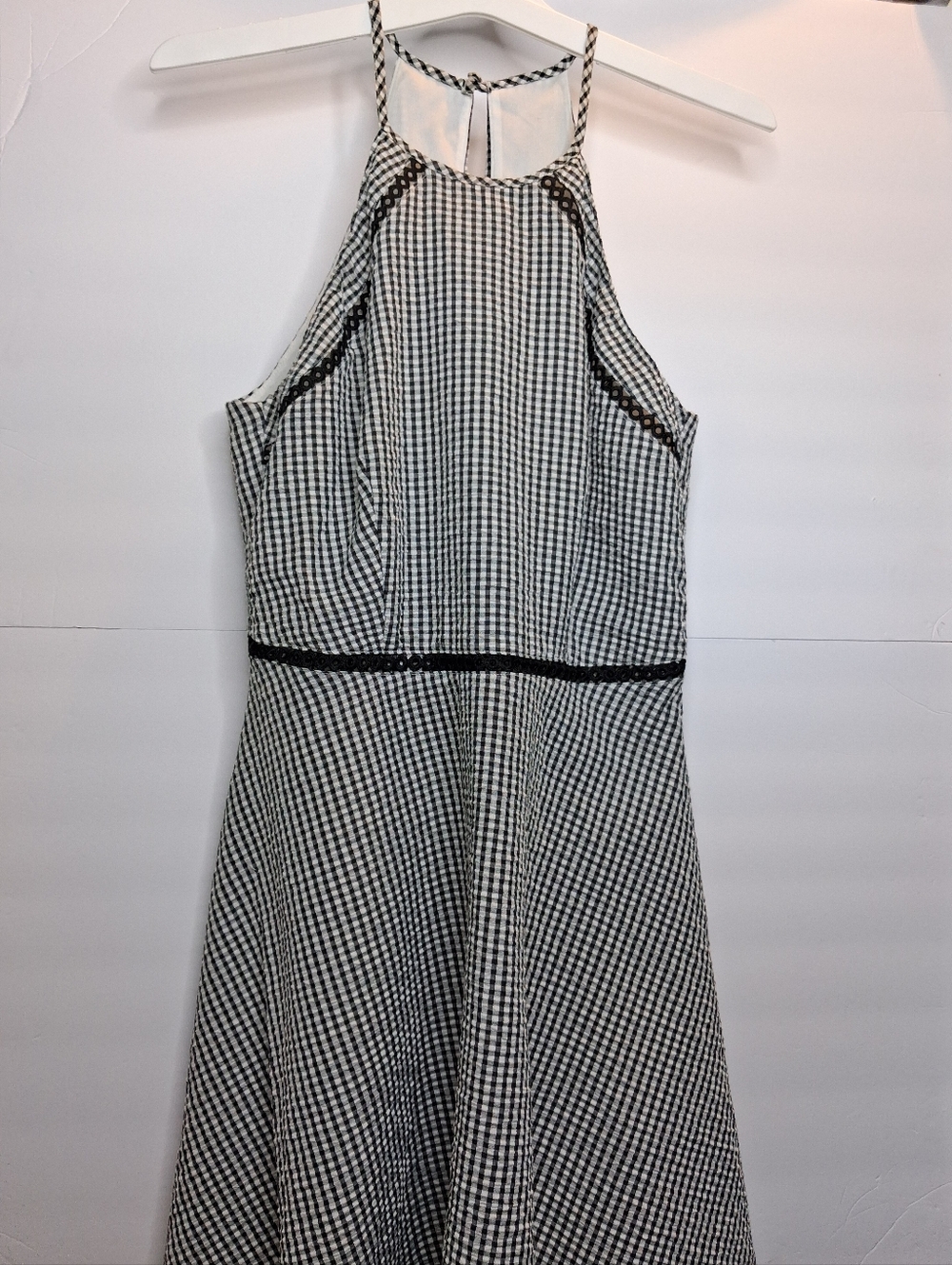 B. Darlin black and white checked halter dress with a keyhole back and lace trim